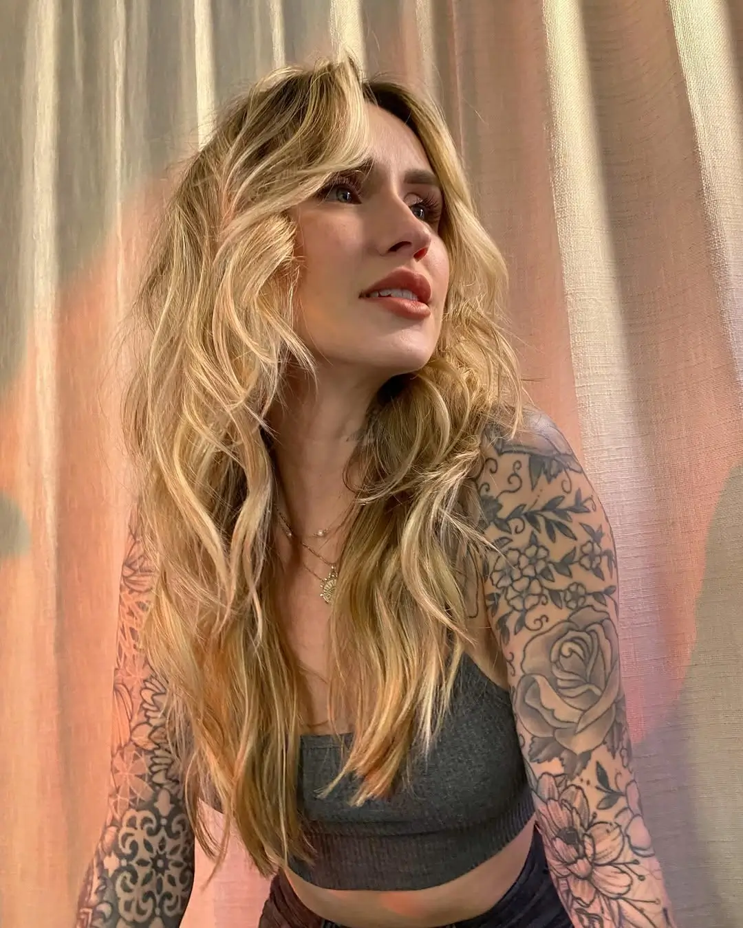 textured summer haircuts for long hair 2026 Sunlit Wavy Layers with Effortless Fringe