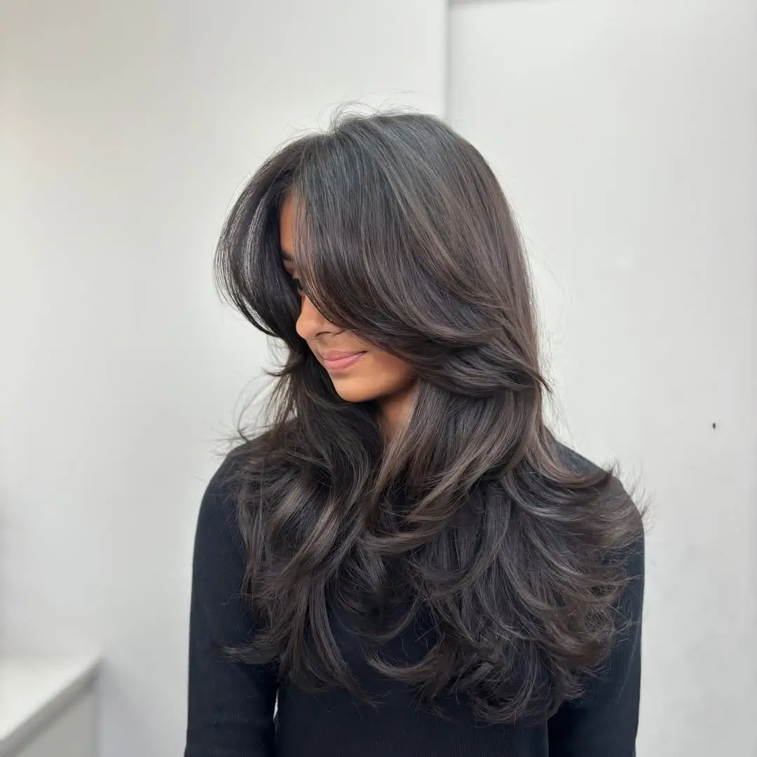 textured summer haircuts for long hair 2026 Glossy Voluminous Layers with Soft Curtain Movement