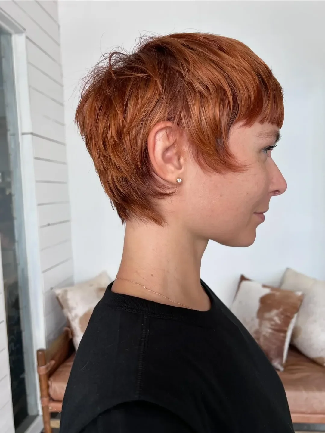 textured summer pixie haircuts 2026 Sunlit Copper Pixie with Feathered Movement