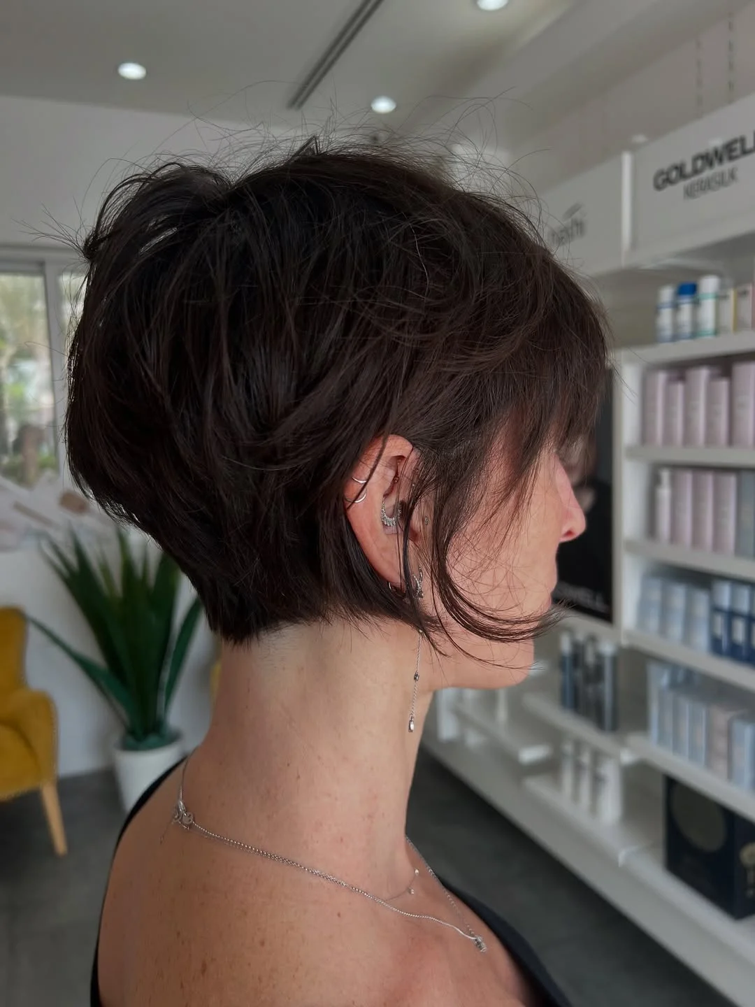 textured summer pixie haircuts 2026 Soft Brunette Pixie with Wispy Layers