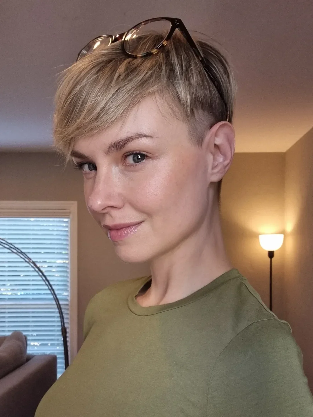textured summer pixie haircuts 2026 Side Swept Blonde Pixie with Undercut Detail