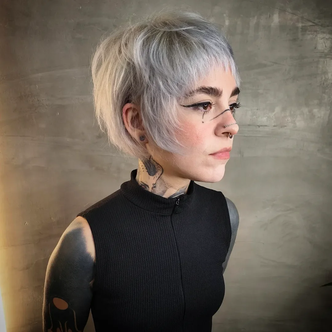 textured summer pixie haircuts 2026 Edgy Platinum Textured Pixie with Micro Fringe