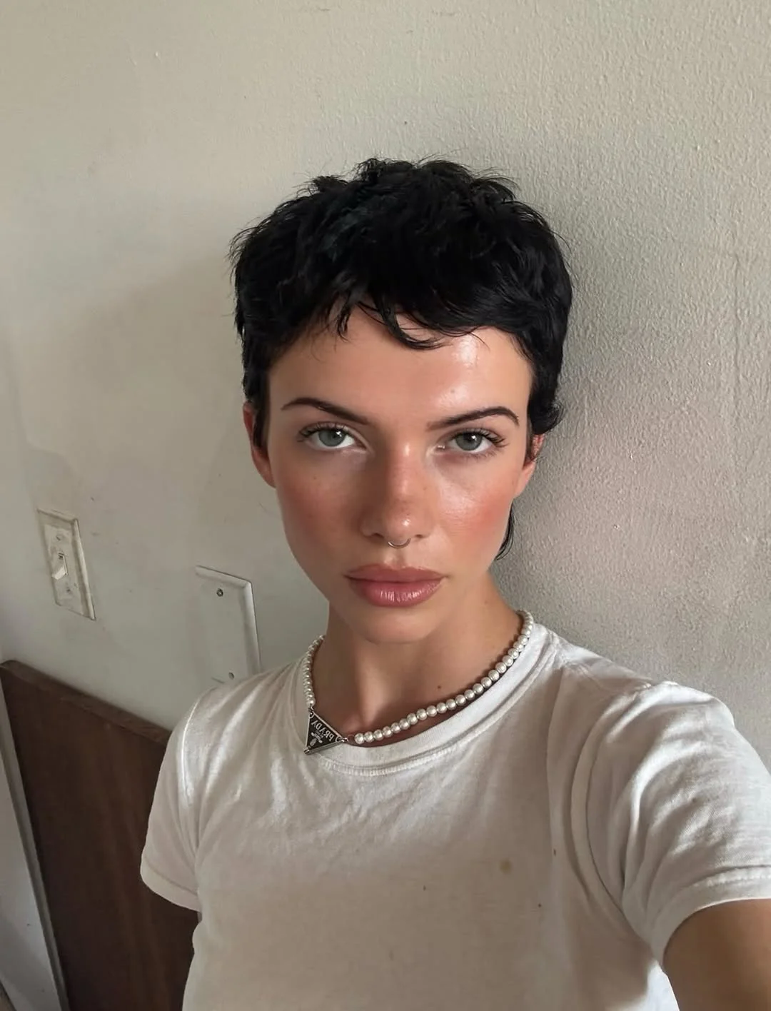 textured summer pixie haircuts 2026 Micro Textured Brunette Pixie with Natural Volume