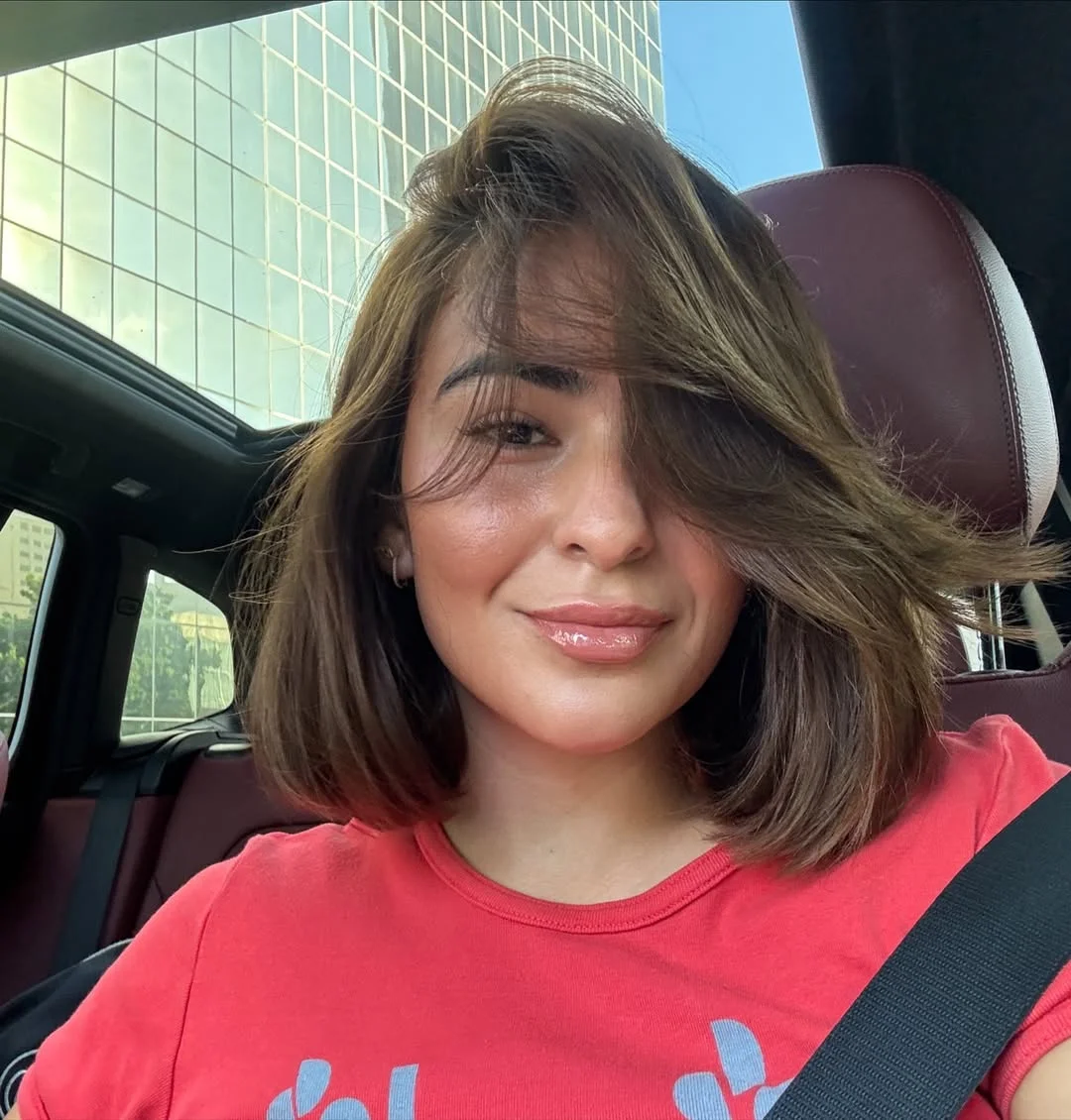 versatile summer haircuts for medium hair 2026 Textured Bob with Side Swept Volume