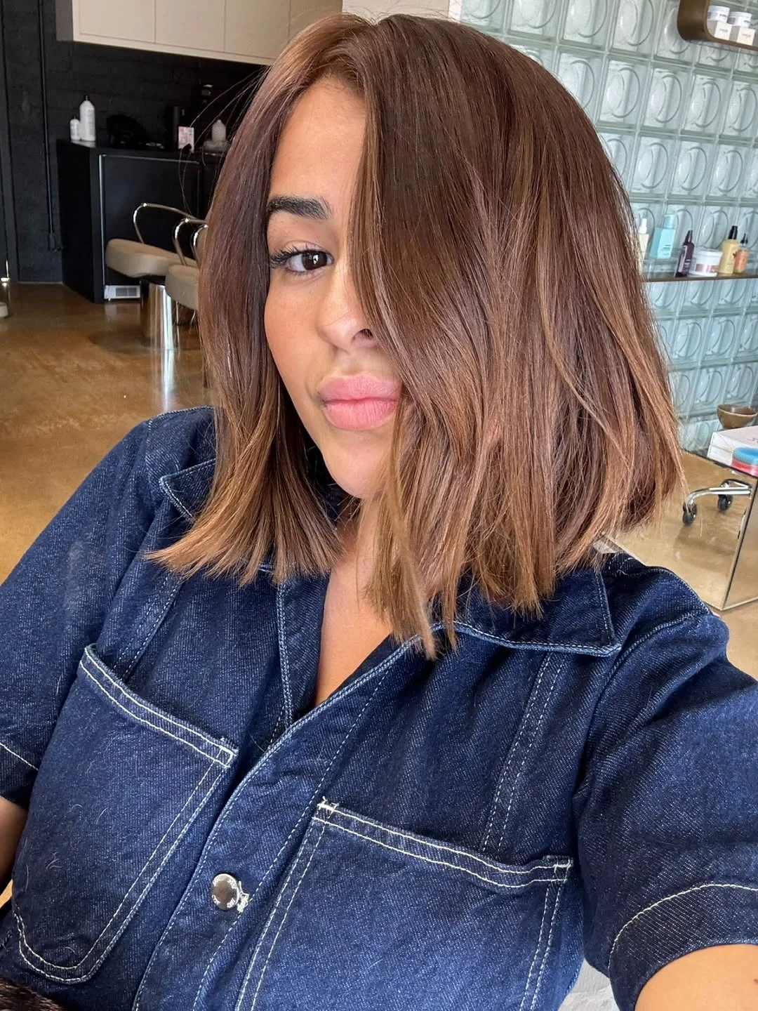 versatile summer haircuts for medium hair 2026 Sleek Blunt Bob with a Modern Edge