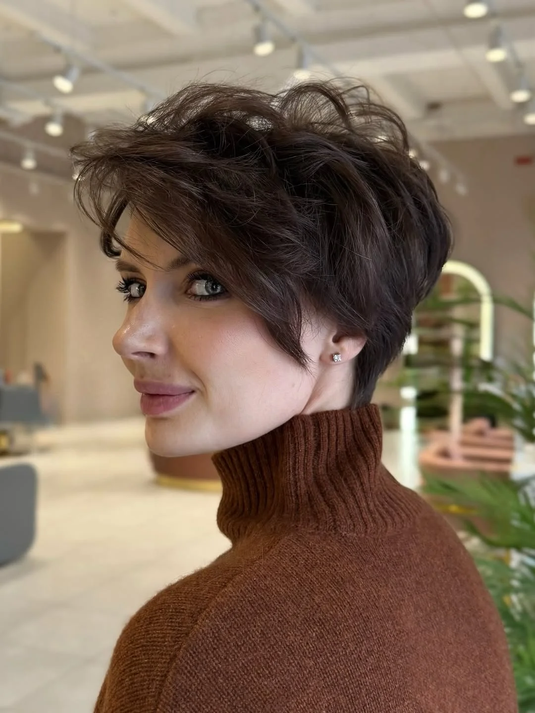 youthful summer haircuts for women over 40 2026 Textured Modern Pixie with Side-Swept Volume
