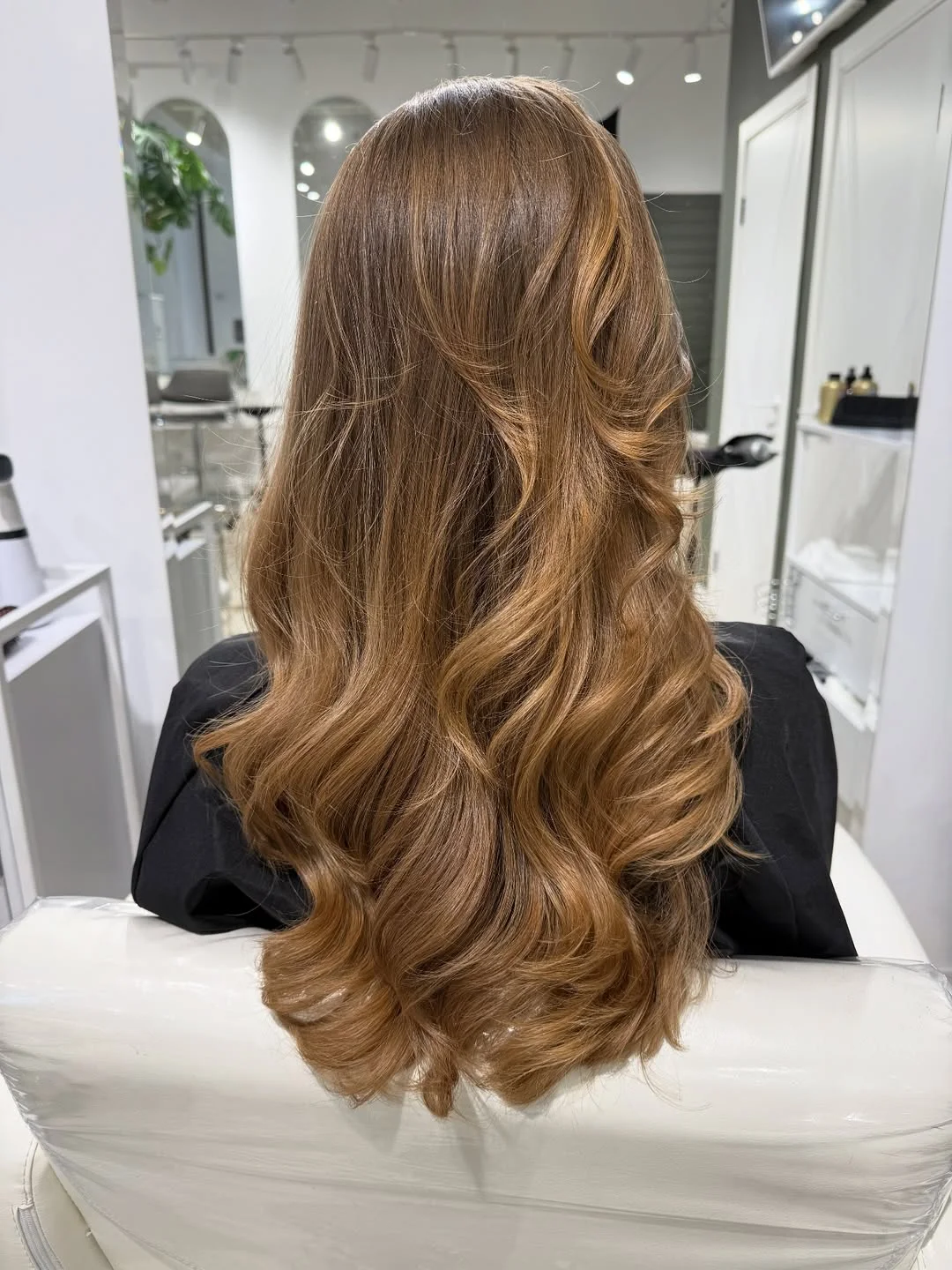 youthful summer haircuts for women over 40 2026 Long Layered Waves with Glossy Dimension
