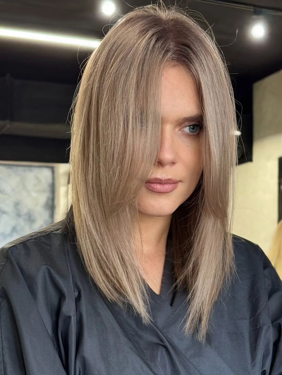 youthful summer haircuts for women over 40 2026 Sleek Blonde Long Bob