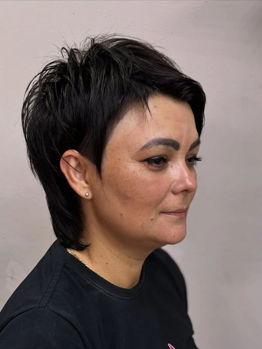 youthful summer haircuts for women over 40 2026 Layered Short Pixie with Volume