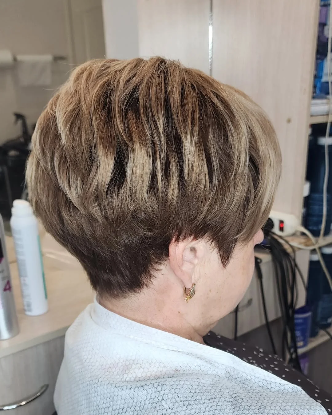 youthful summer haircuts for women over 40 2026 Textured Short Bob with Dimension