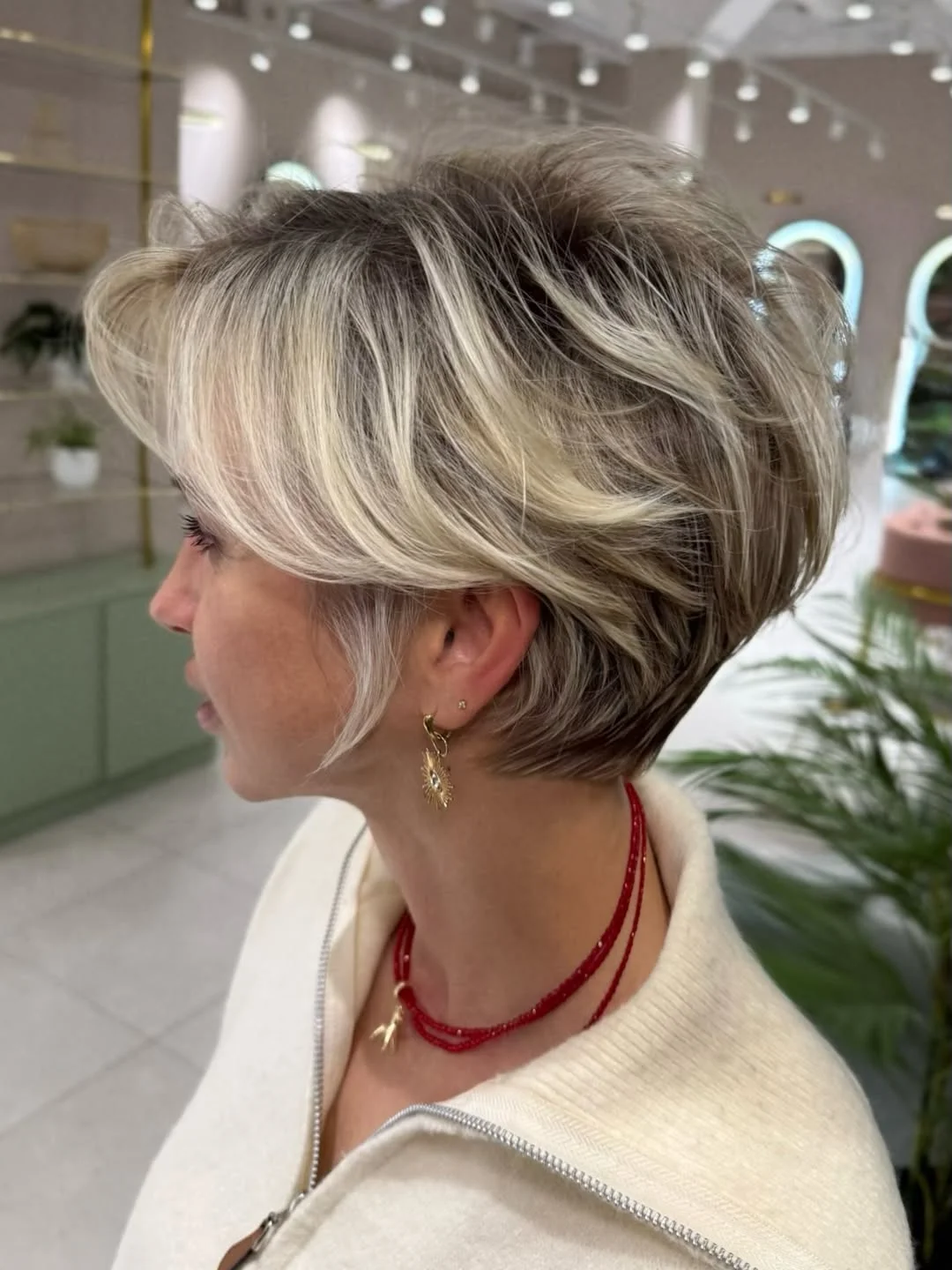 youthful summer haircuts for women over 40 2026 Voluminous Layered Pixie with Light Contrast