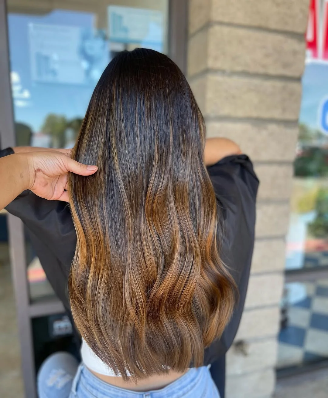 caramel summer ombre hair color 2026 Glossy Brunettes Highlights With Golden Threads