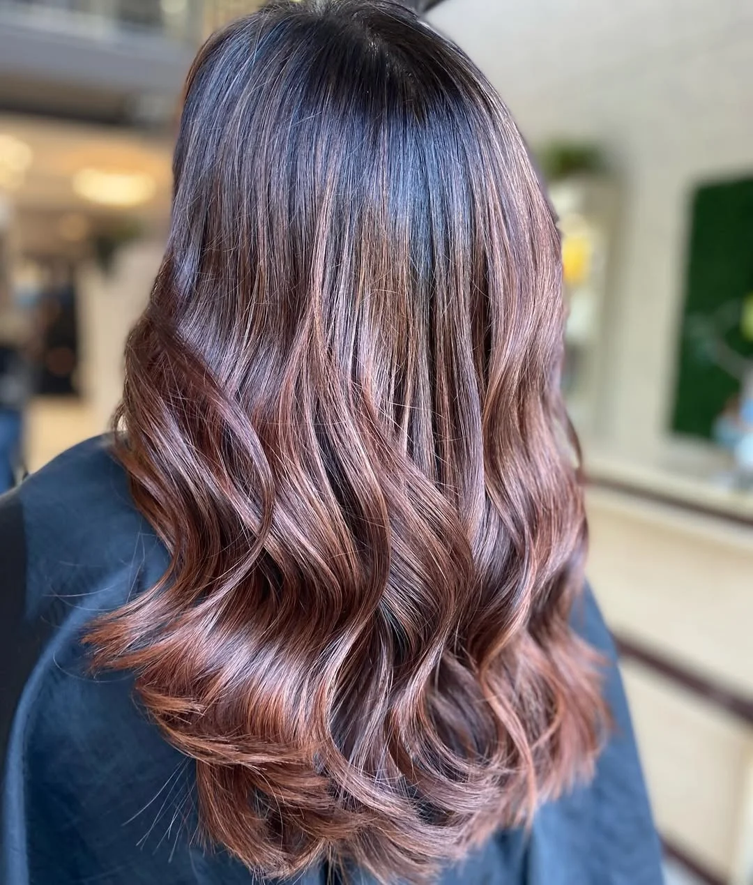 caramel summer ombre hair color 2026 Deep Burgundy Brown Waves With Caramel Ends
