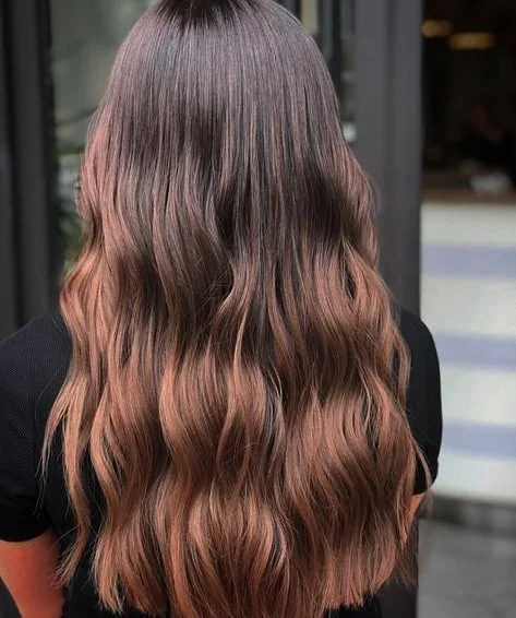 caramel summer ombre hair color 2026 Sunlit Brunettes Honey Waves With Soft Dimension