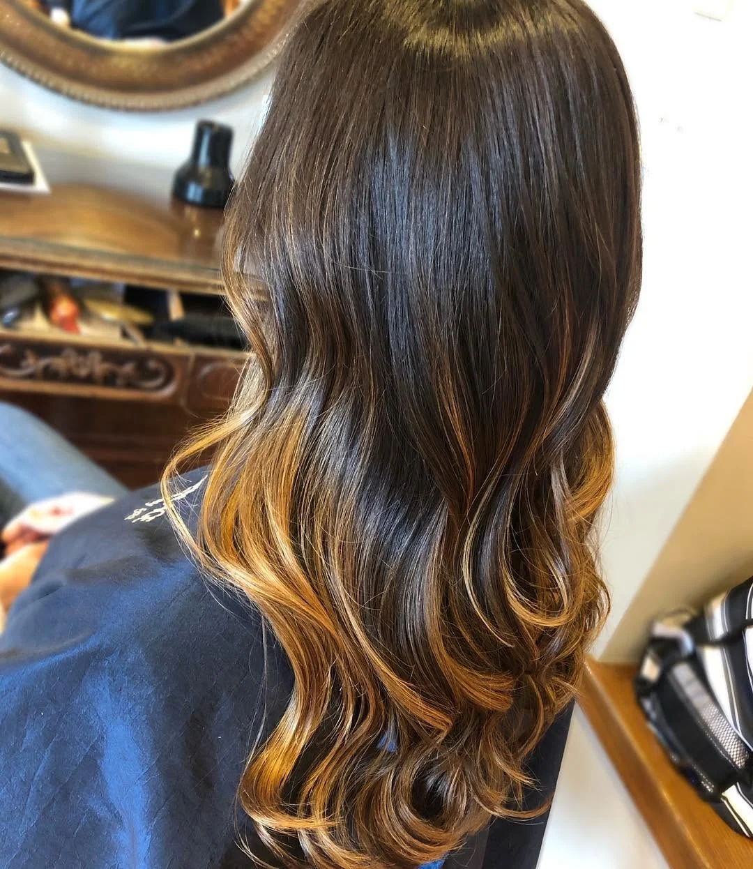 caramel summer ombre hair color 2026 Soft Melt Caramel Waves for Modern Brunettes