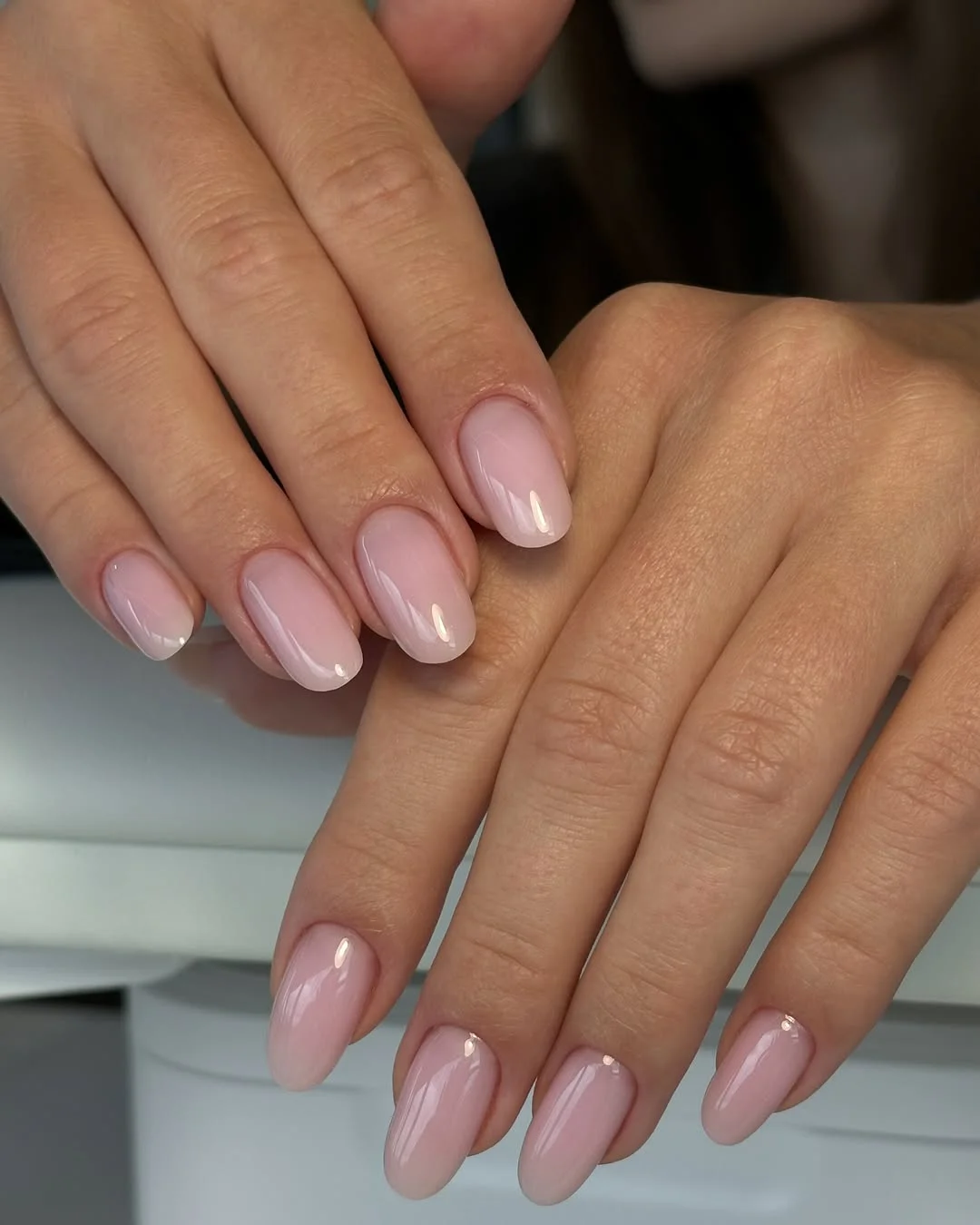 chic light summer nails 2026 Glossy Milky Pink Almond Nails