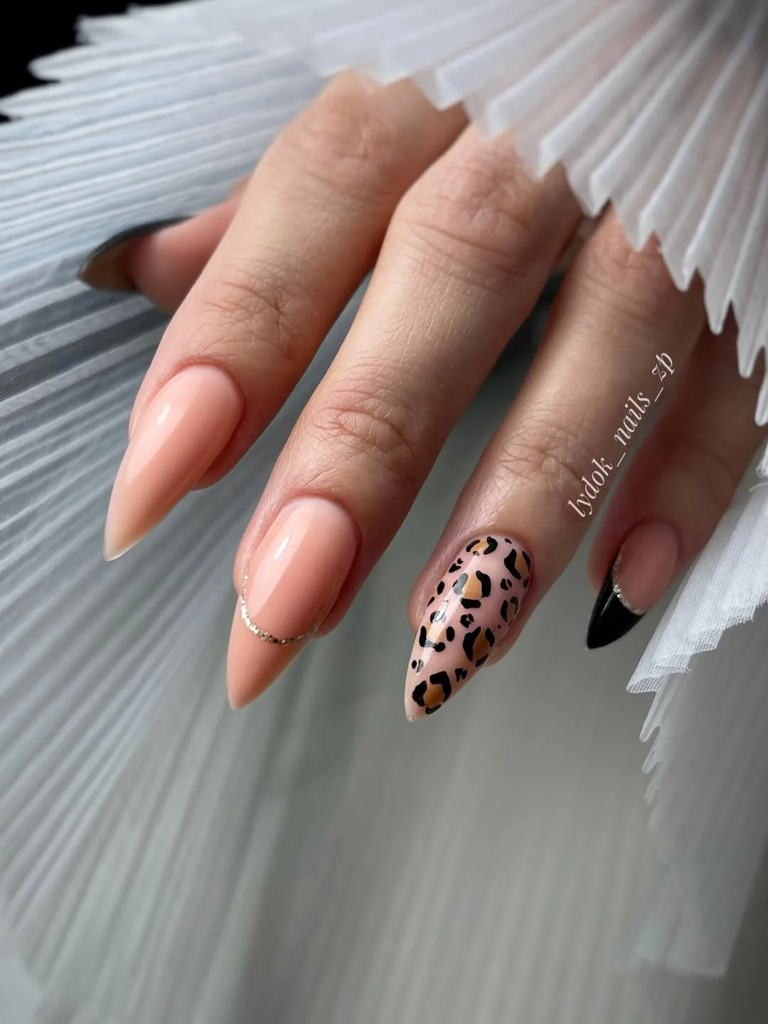 chic light summer nails 2026 Soft Nude Leopard Nails with Modern Edge