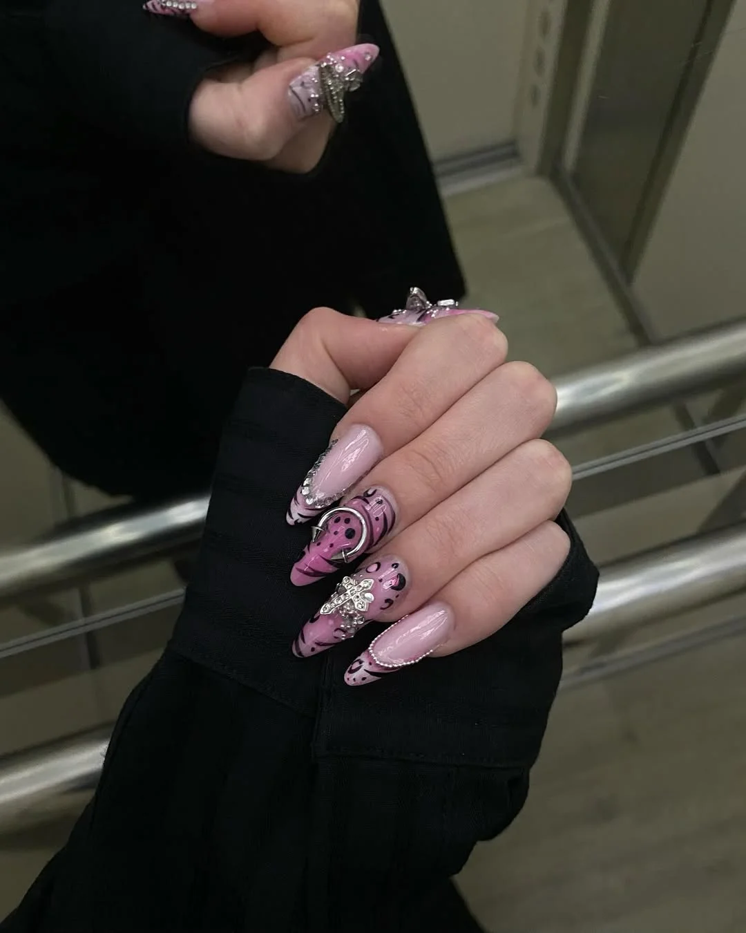 chic light summer nails 2026 Pink Statement Nails with Y2K Glam Details
