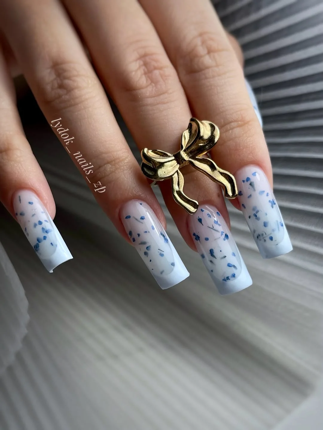 chic light summer nails 2026 Blue Petal Confetti for Breezy Summer Days