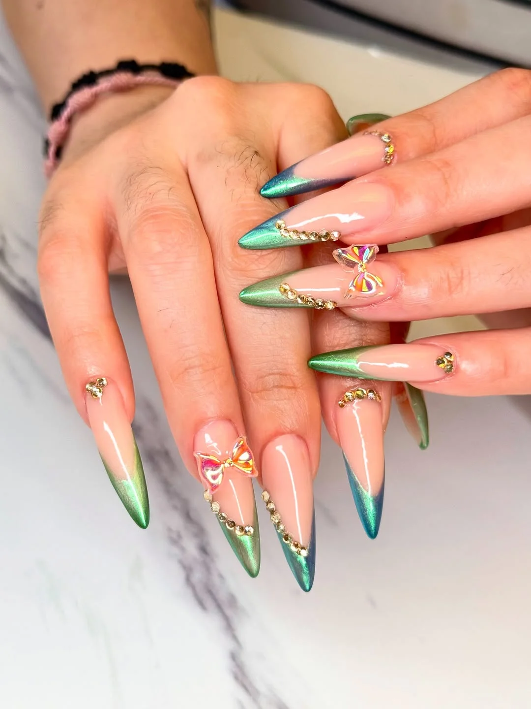 chic summer stiletto nails 2026 Metallic Green Glamour With Crystal Accents