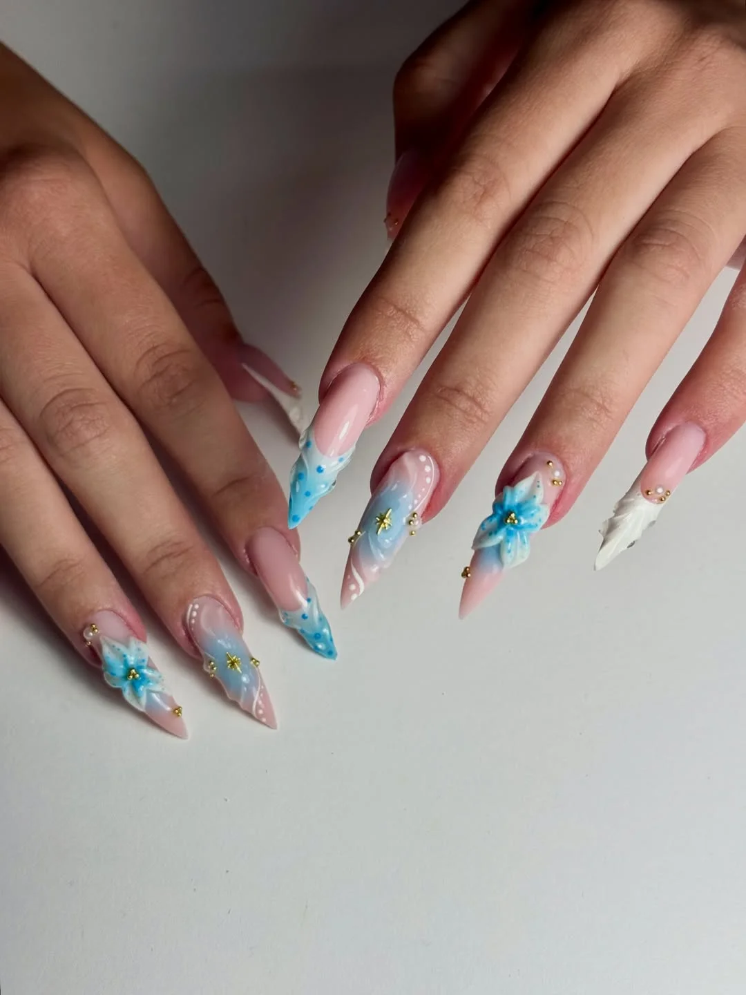 chic summer stiletto nails 2026 Blue Blossom Fantasy Nails
