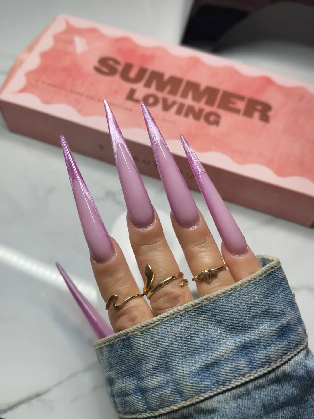 chic summer stiletto nails 2026 Glossy Lavender Stiletto Simplicity