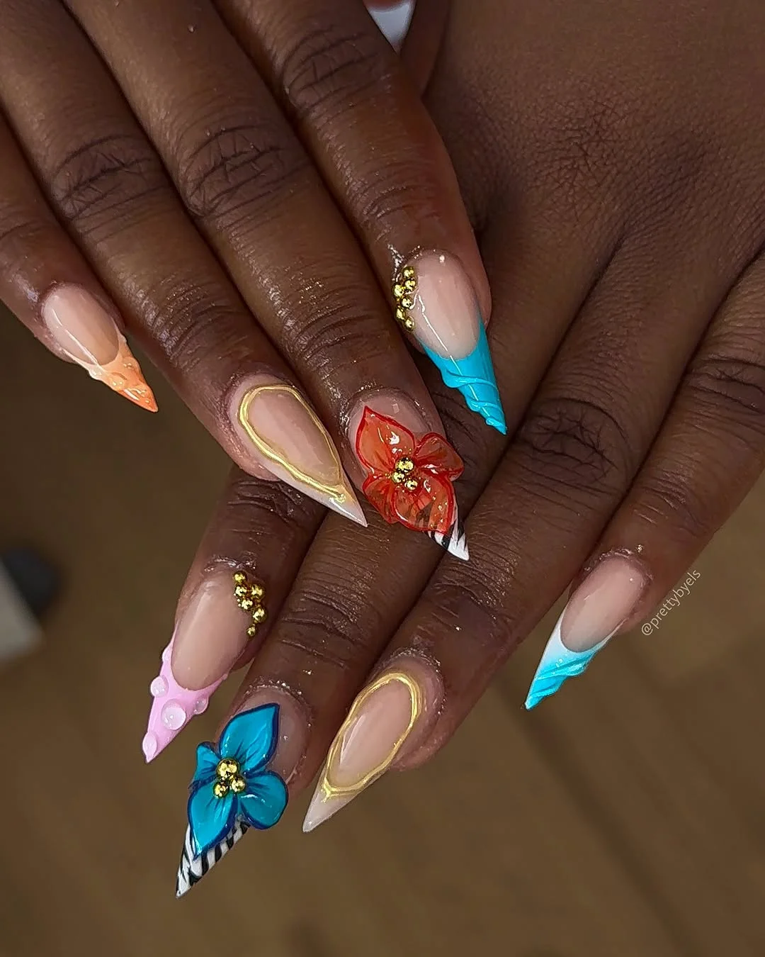 chic summer stiletto nails 2026 Modern Florals With Colorful French Tips