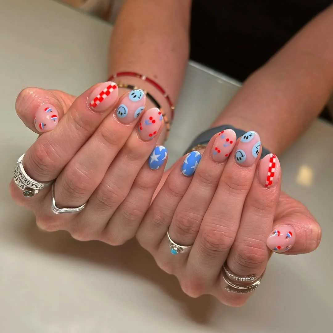 cool 4th of july nails 2026 Minimalist Star Nails With Playful Smiley Faces