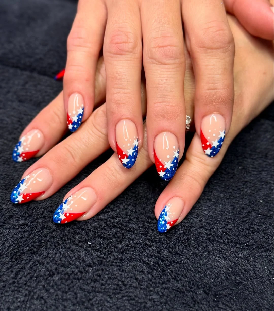 cool 4th of july nails 2026 Firework French Tips With Starry Blue Accents