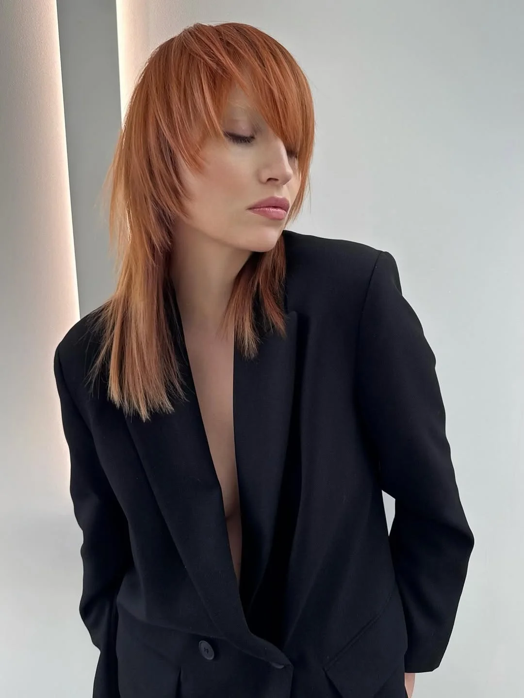 cool summer hair color for light skin 2026 Layered Copper Shag with Soft Edge