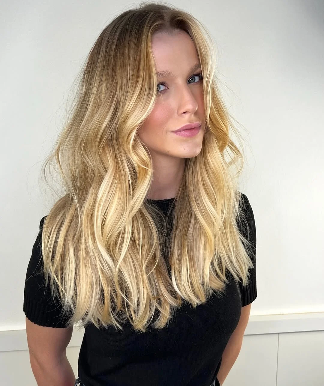 cool summer hair color for light skin 2026 Soft Beach Blonde with Natural Texture