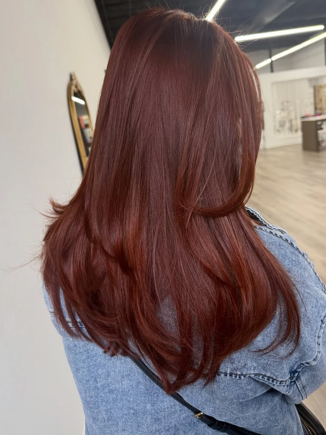 copper summer red hair color 2026 Sleek Layered Auburn Copper with Polished Volume