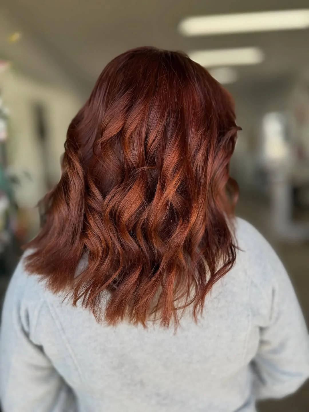 copper summer red hair color 2026 Muted Cinnamon Copper Waves for Everyday Glow