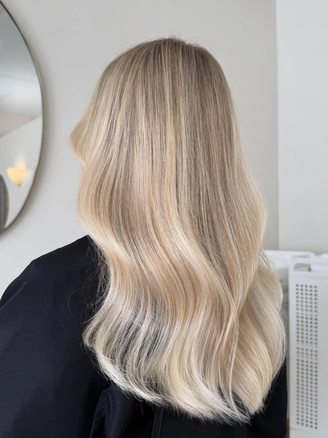 creamy summer blonde hair color 2026 Soft Vanilla Melt with Seamless Layers