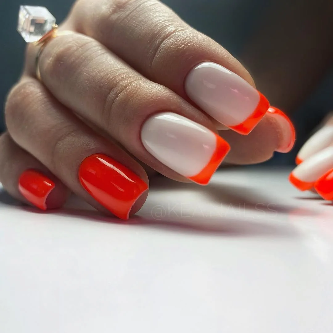 cute bright summer nails 2026 Neon Coral French Tips With a Modern Twist