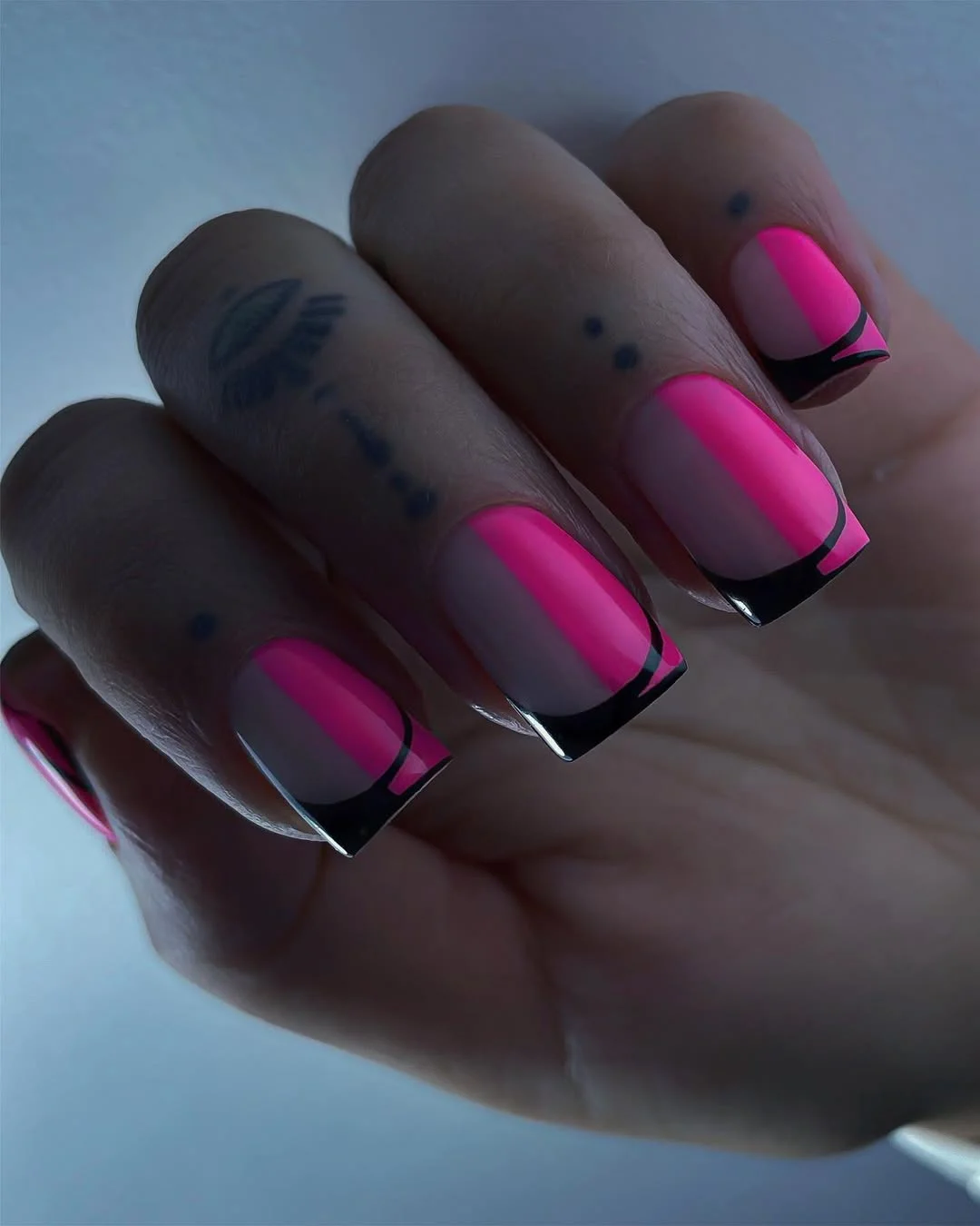cute bright summer nails 2026 Hot Pink and Black Graphic French Design