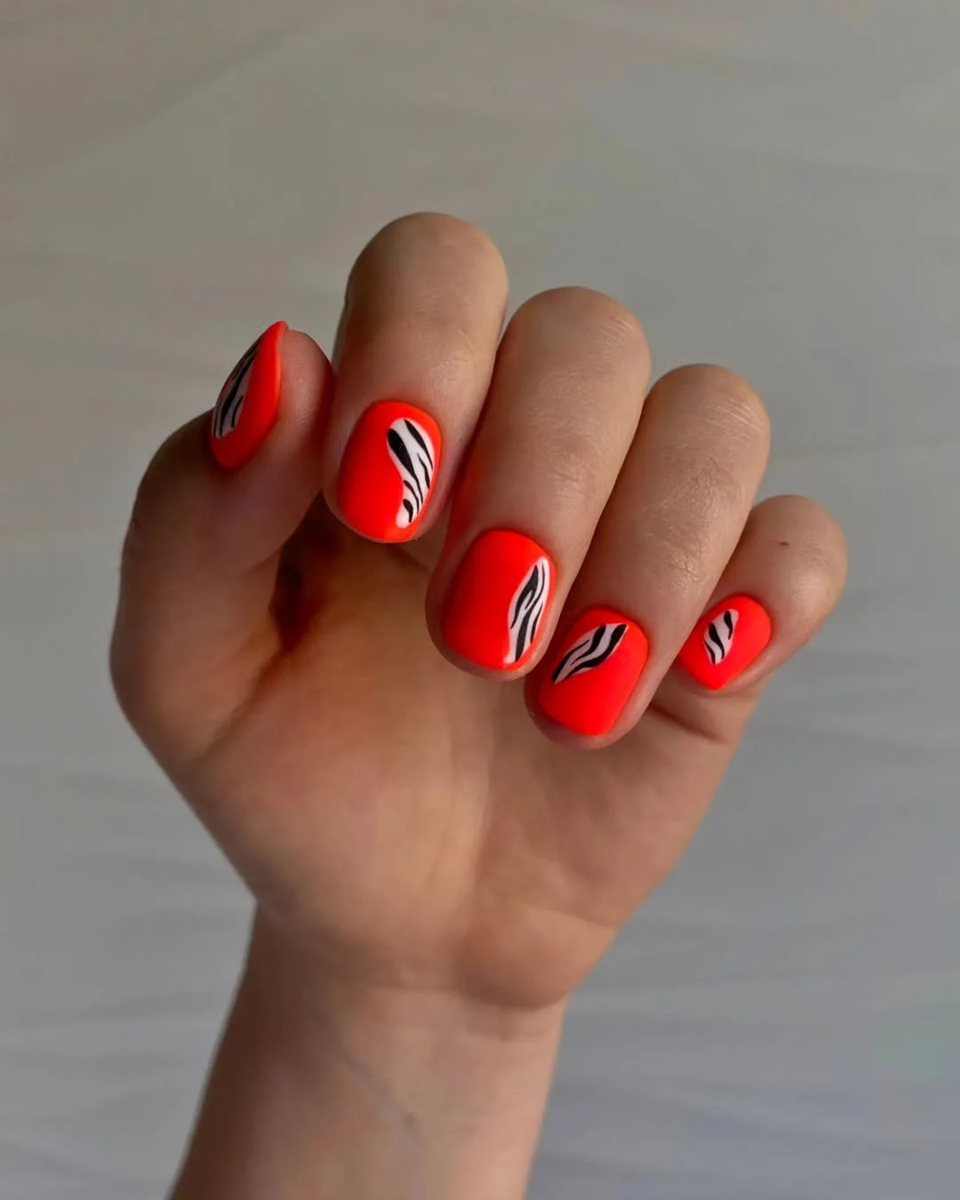 cute bright summer nails 2026 Coral Zebra Print Short Nails