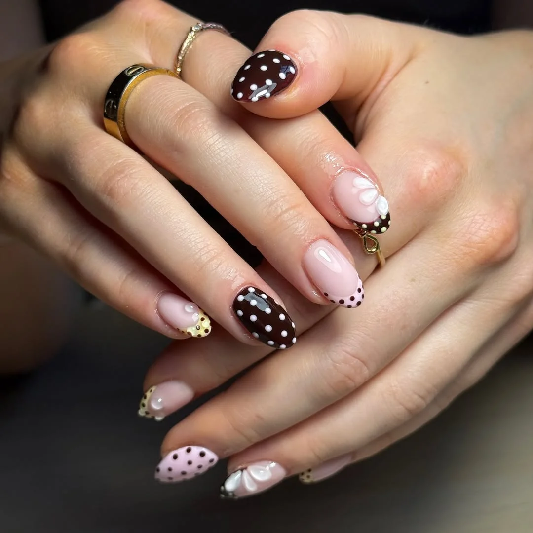 cute polka dot summer nails 2026 Mixed Polka Dot French Tips With Bow Details