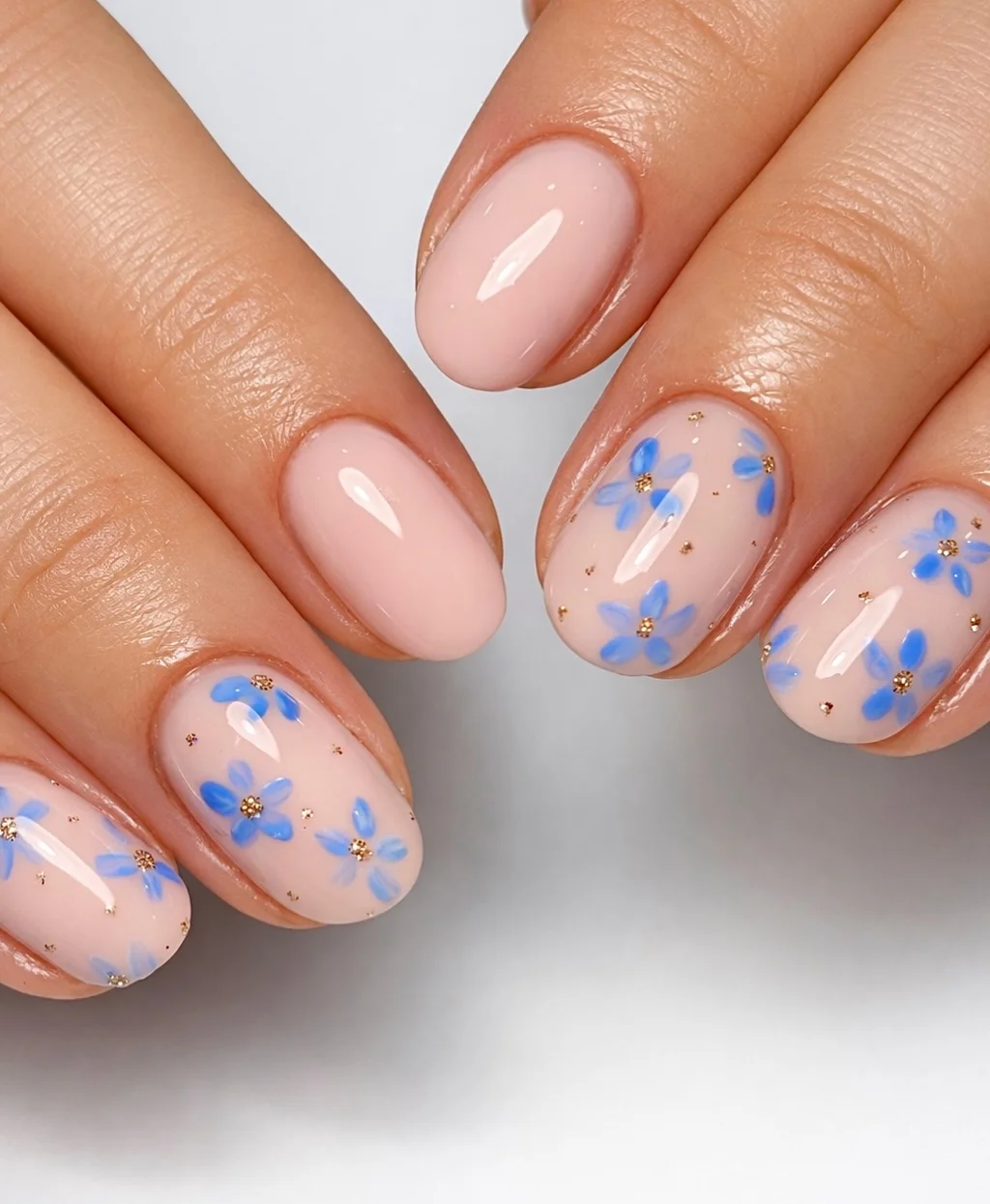 cute summer flower nails 2026 Soft Blue Floral Minimal Nails
