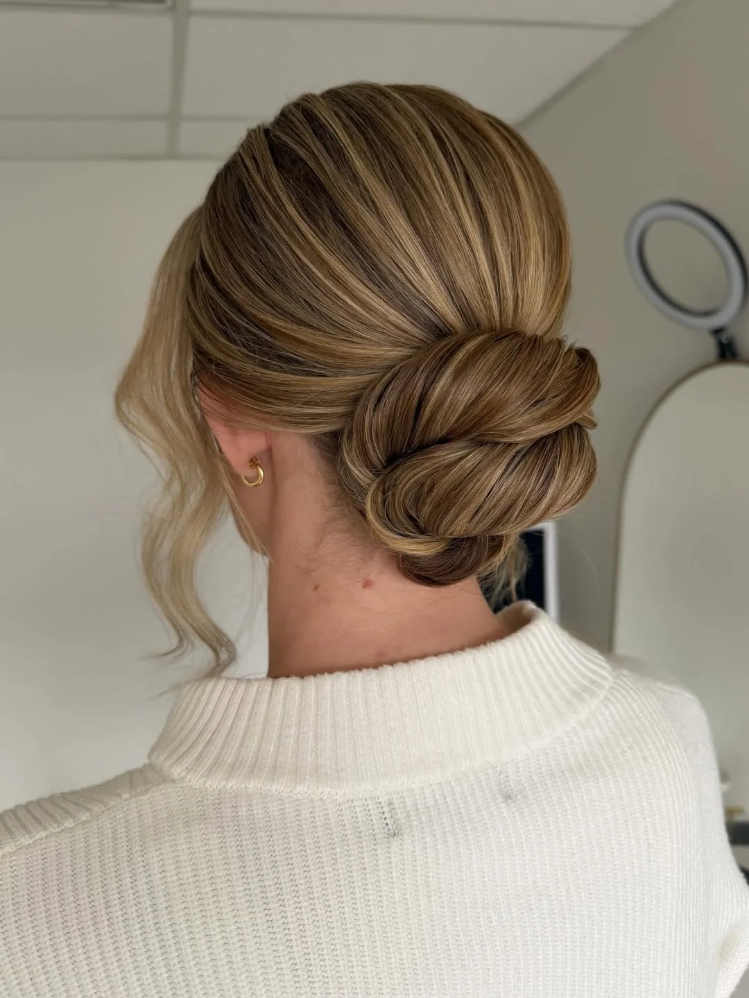 easy summer hairstyles ideas 2026 Elegant Low Bun With Smooth Dimension