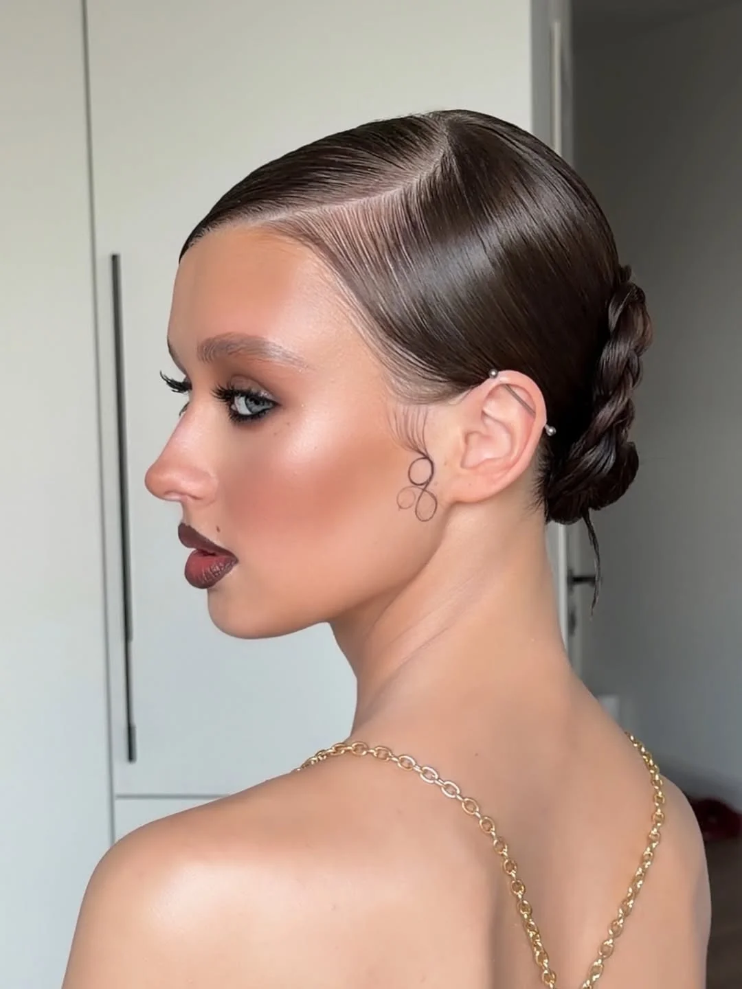 easy summer quick hairstyles 2026 Sleek Braided Low Bun