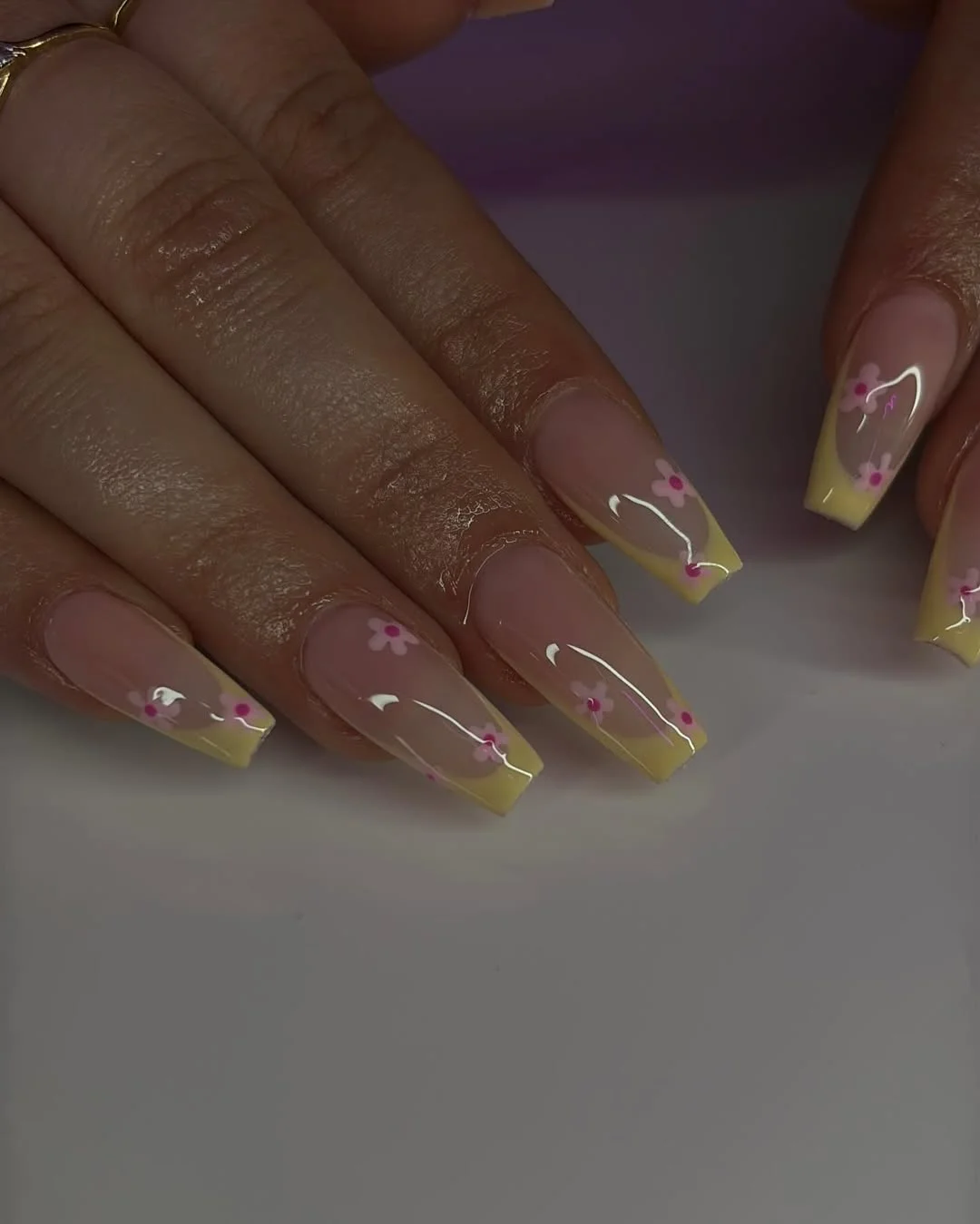 edgy summer nails ballerina shape 2026 Soft Yellow French Tips With Tiny Flowers