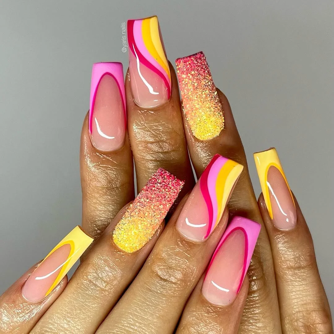 edgy summer nails ballerina shape 2026 Pink And Yellow Swirl Glitter Nails