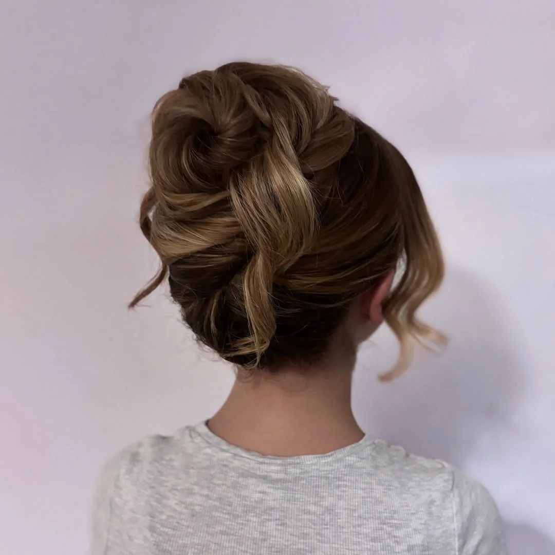 effortless summer easy hairstyle 2026 Elegant Twisted Low Bun