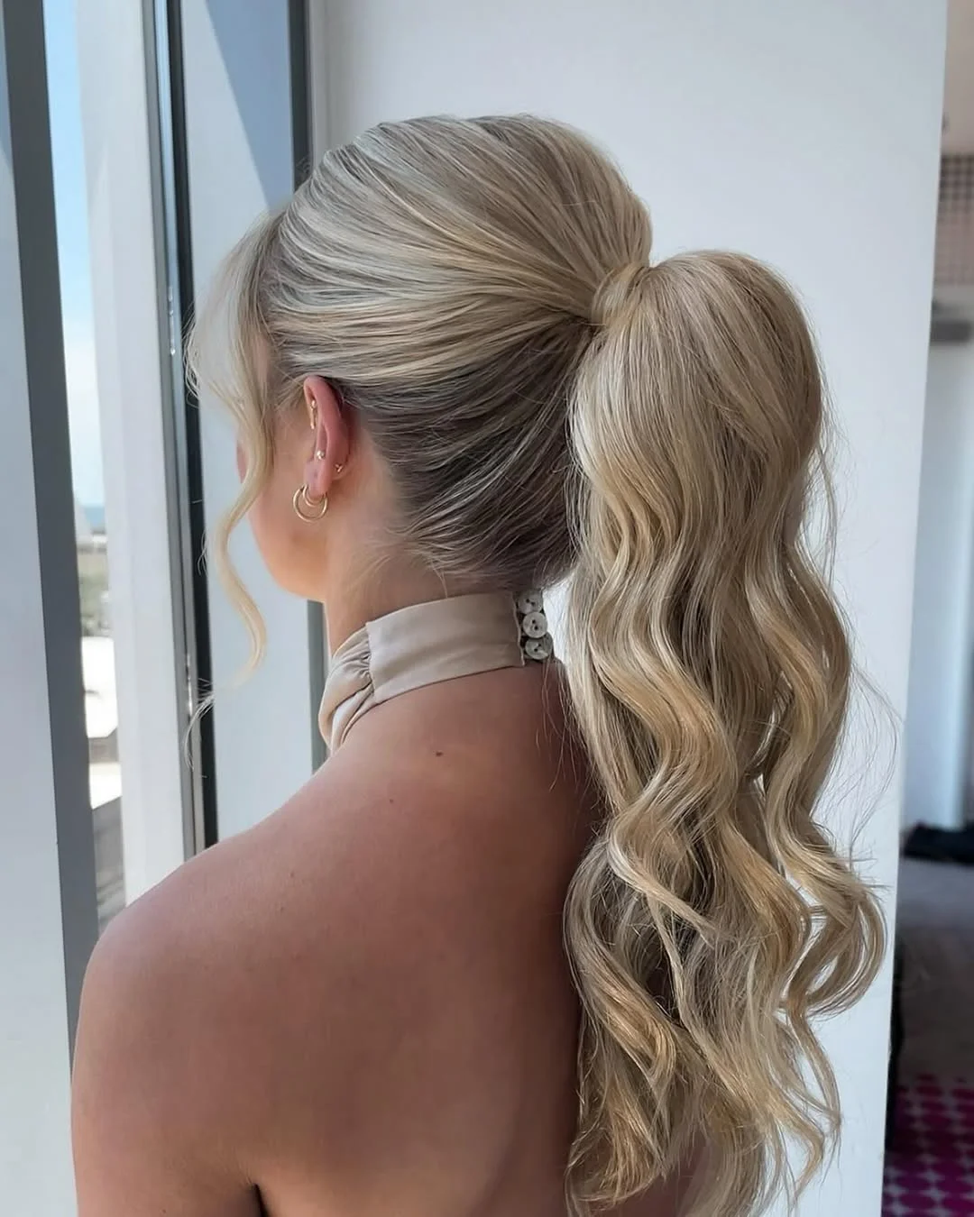 effortless summer easy hairstyle 2026 High Ponytail With Soft Waves
