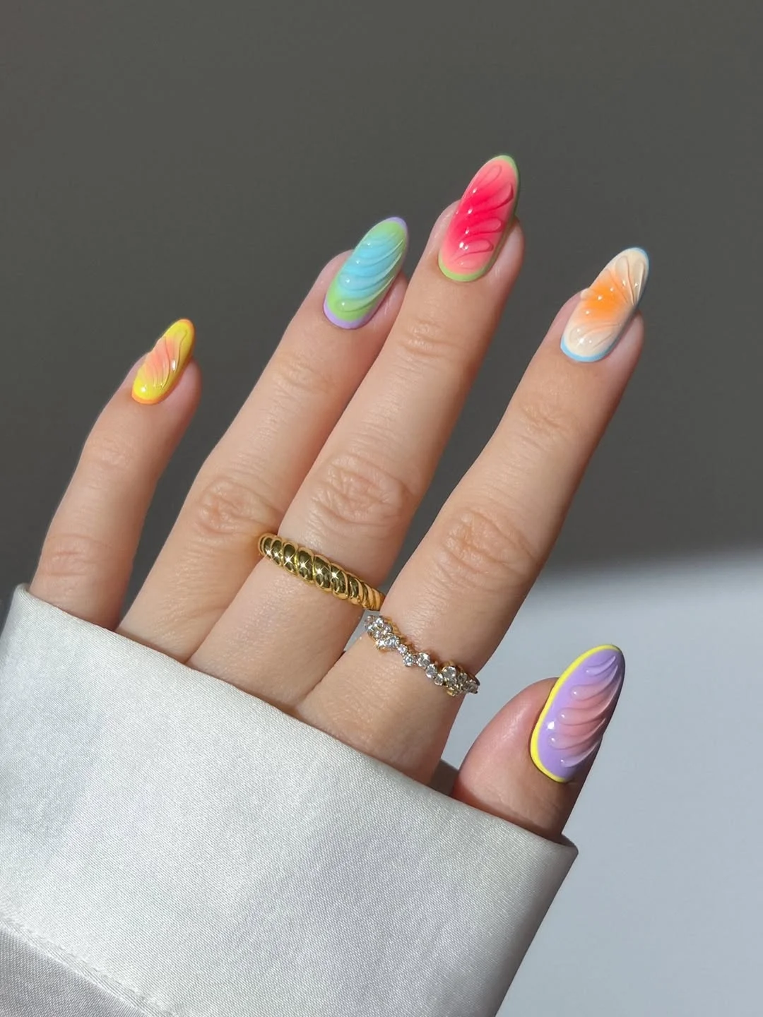 fun & funky summer nails 2026 Dreamy Pastel Aura Nails with Sculpted Waves