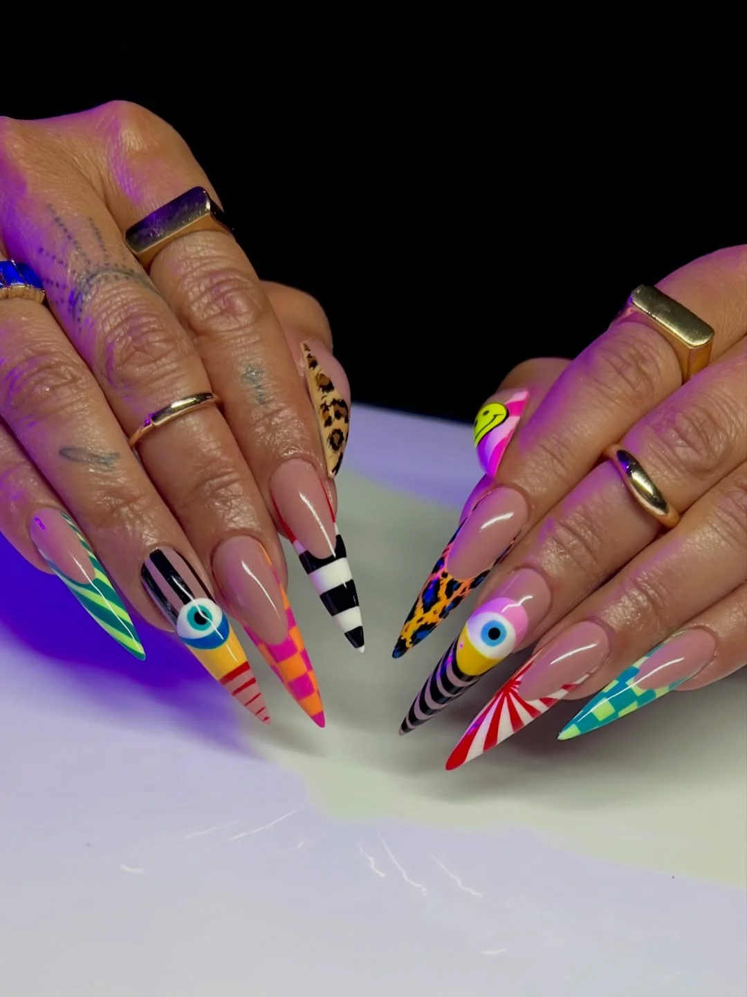 fun & funky summer nails 2026 Maximalist Graphic Stiletto Statement