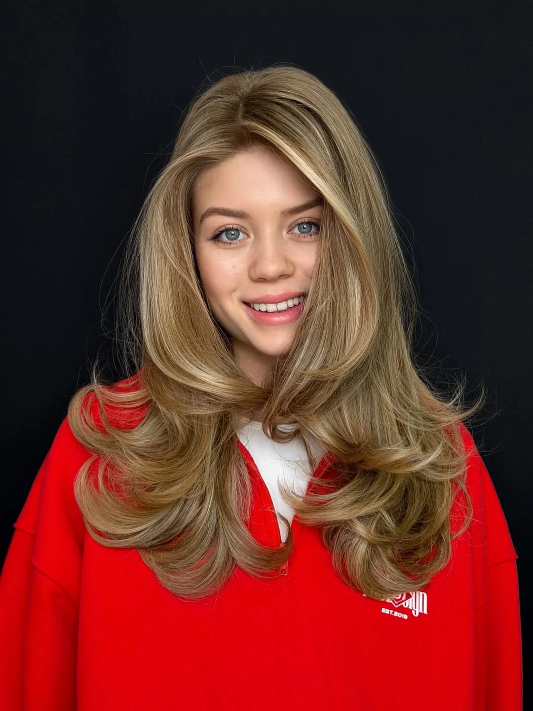 golden summer honey blonde hair color 2026 Classic Honey Blonde with a Polished Blowout Finish