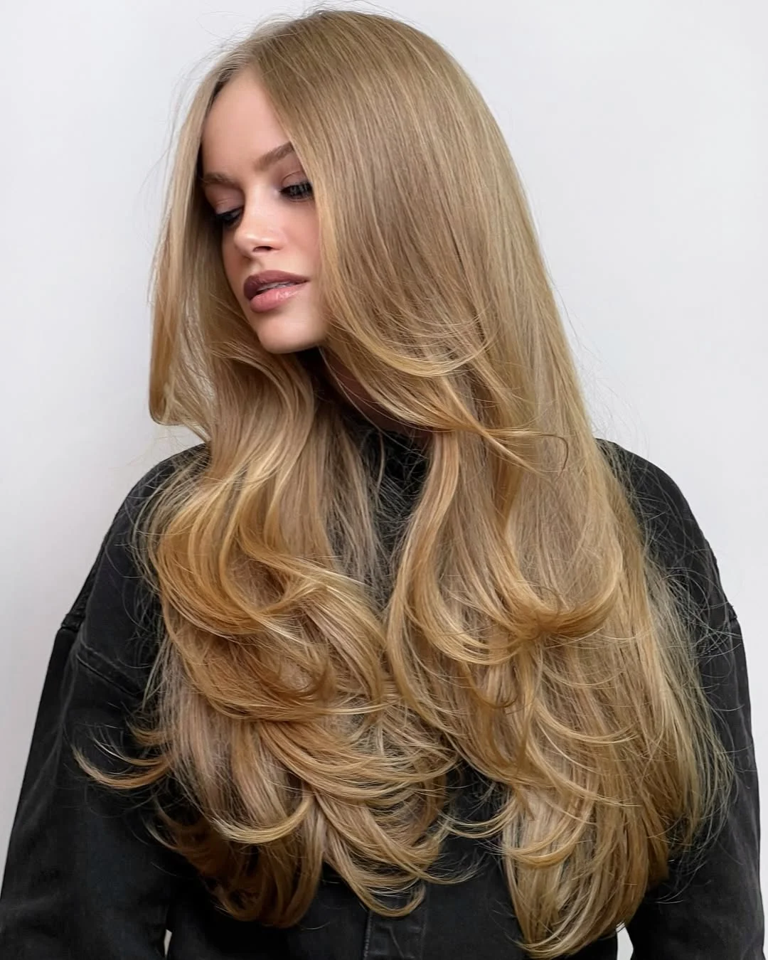 golden summer honey blonde hair color 2026 Glossy Honey Blonde Layers with Sculpted Volume