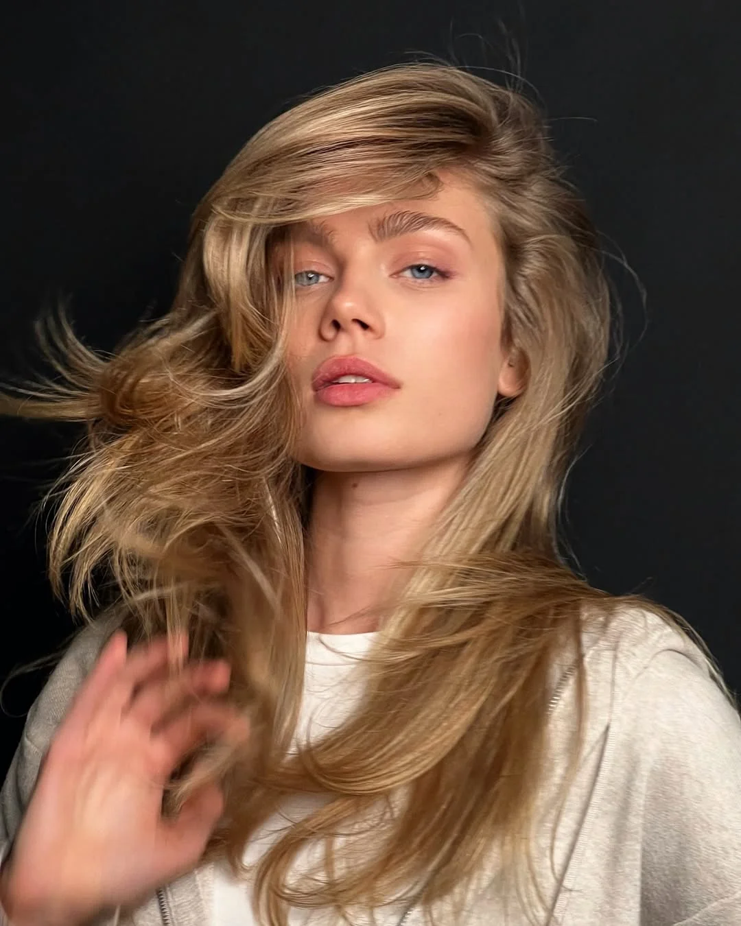 golden summer honey blonde hair color 2026 Side Swept Volume with Caramel Movement